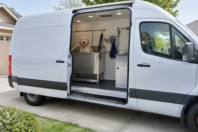 Mobile grooming van with a dog inside